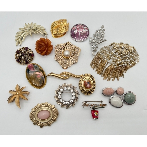 1070 - 16 assorted vintage brooches and scarf clips to include stone set, enamelled and gold tone examples.... 