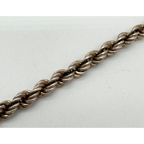 1152 - A chunky silver twisted rope chain bracelet with lobster claw clasp. Approx. 7.5