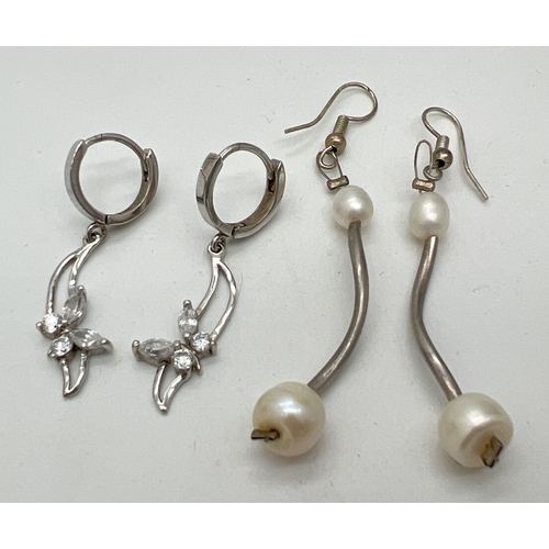 1159 - 2 pairs of drop style earrings. A silver pair of huggie style hoops with twist style drops and stone... 