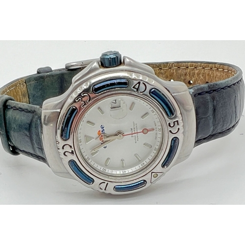 1176 - 2 womens wristwatches. An Ellesse 1115256 watch with date function window, blue leather strap and ro... 