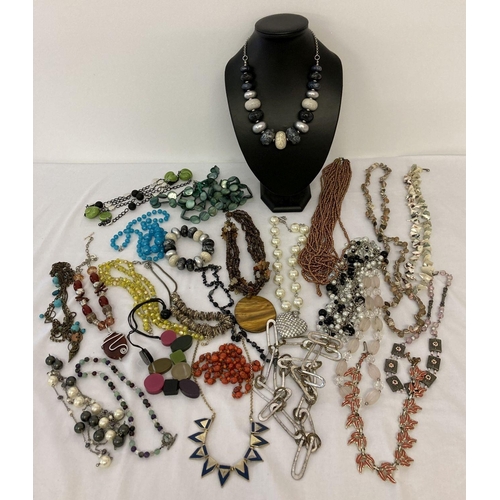 1007 - A collection of costume jewellery statement necklaces in varying lengths and styles. To include shel... 