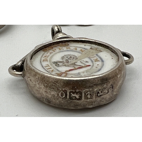 1018 - 3 items of vintage silver jewellery. A circular brooch with bird decoration and name Hethersett, com... 