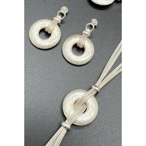 1045 - A modern design matching set of silver drop earrings, necklace and bracelet. Multi foxtail chains wr... 