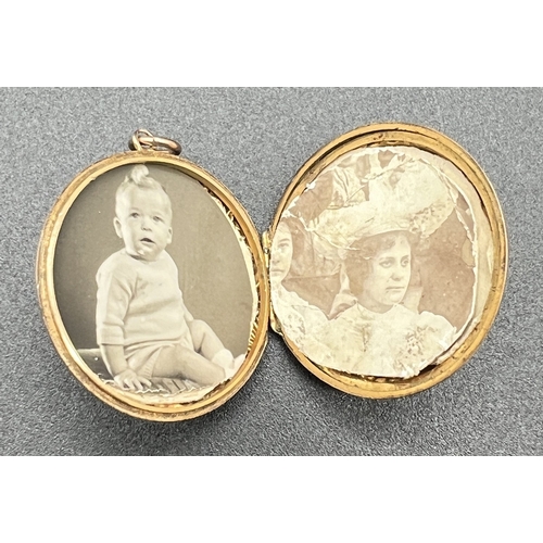 1092 - A large antique 9ct rose gold circular shaped locket, heavily engraved with scroll and foliate desig... 