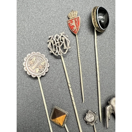 1095 - A collection of 15 assorted antique stick pin brooches, mostly silver, to include gold overlay, anim... 