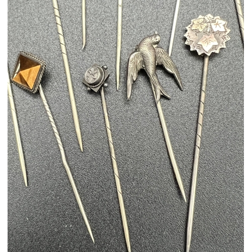 1095 - A collection of 15 assorted antique stick pin brooches, mostly silver, to include gold overlay, anim... 