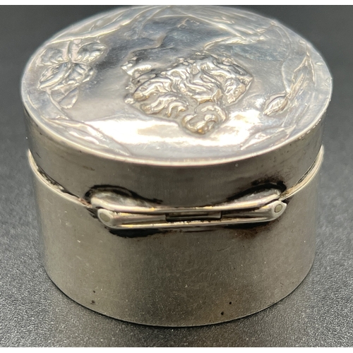 1185 - An Art Nouveau silver trinket box, fully hallmarked for Birmingham 1901, with embossed maiden design... 