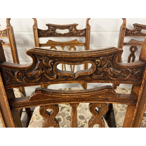 1365 - A set of 6 early 20th century carve backed dining chairs, with original caster front feet and turned... 