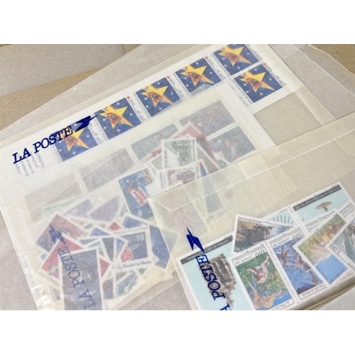 163 - A collection of 1990's La Poste French postage stamps, in mint condition, with original invoices & p... 