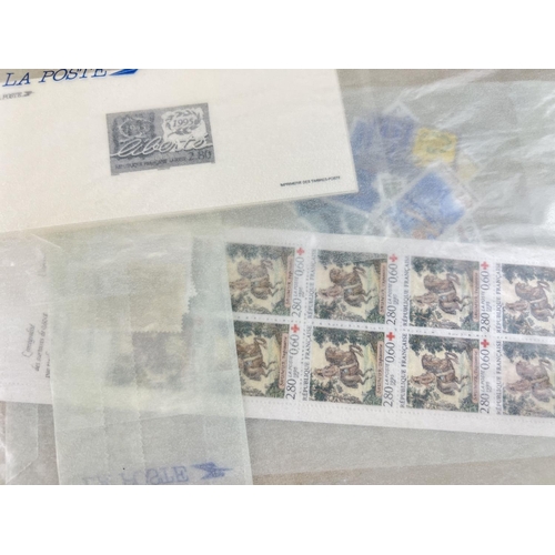 163 - A collection of 1990's La Poste French postage stamps, in mint condition, with original invoices & p... 