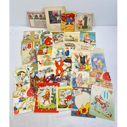 284 - A box of assorted vintage greetings cards, of varying designs and styles.