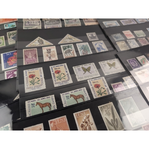 107 - 27 collectors sleeves of world stamps, both franked and unfranked. To include examples from Poland, ... 