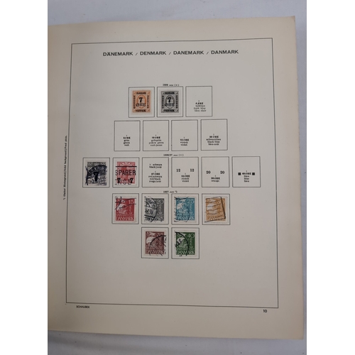 113 - 2 Schaubek Danmark stamp albums containing a quantity of Danish stamps in various conditions. Albums... 