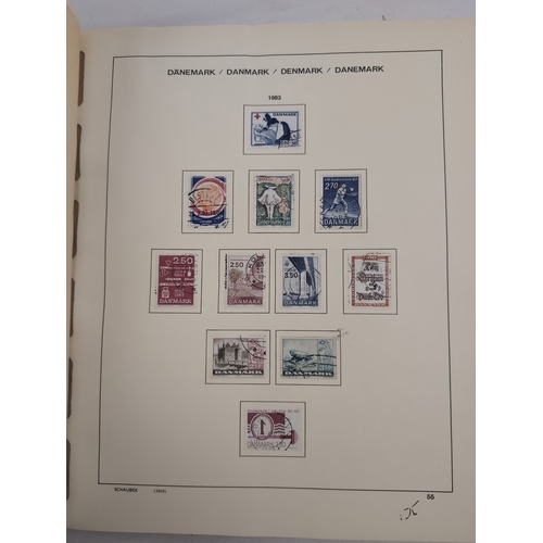 113 - 2 Schaubek Danmark stamp albums containing a quantity of Danish stamps in various conditions. Albums... 