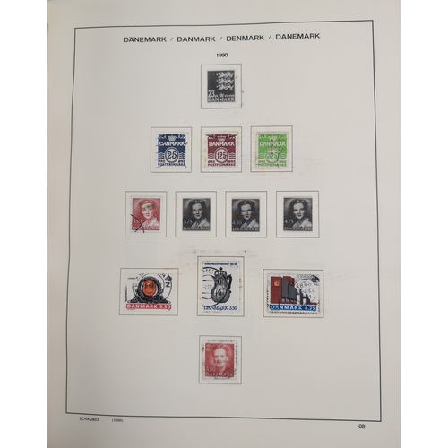 113 - 2 Schaubek Danmark stamp albums containing a quantity of Danish stamps in various conditions. Albums... 