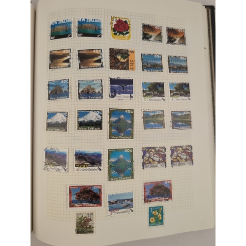 118 - 2 vintage stamp stock books containing a collection of stamps from around the world. Blue album cont... 