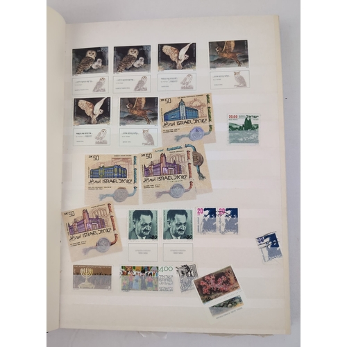 118 - 2 vintage stamp stock books containing a collection of stamps from around the world. Blue album cont... 