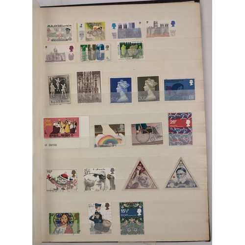 127 - 2 vintage stamp stock books containing both British and foreign stamps in varying conditions. To inc... 