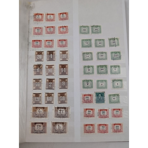 127 - 2 vintage stamp stock books containing both British and foreign stamps in varying conditions. To inc... 