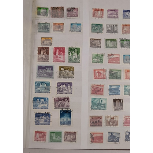 127 - 2 vintage stamp stock books containing both British and foreign stamps in varying conditions. To inc... 