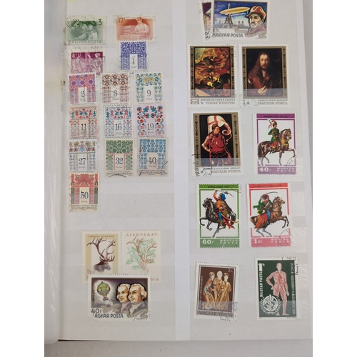 127 - 2 vintage stamp stock books containing both British and foreign stamps in varying conditions. To inc... 