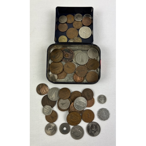 19 - 2 small tubs/tins of vintage foreign coins to include examples from Ireland, Dubai, India and United... 