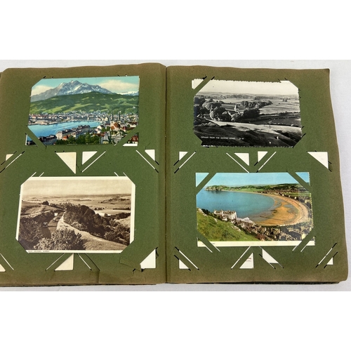 170 - A vintage album of approx. 120 assorted vintage, mostly black & white postcards, together with 25 lo... 