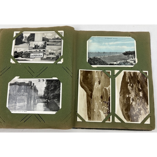 170 - A vintage album of approx. 120 assorted vintage, mostly black & white postcards, together with 25 lo... 