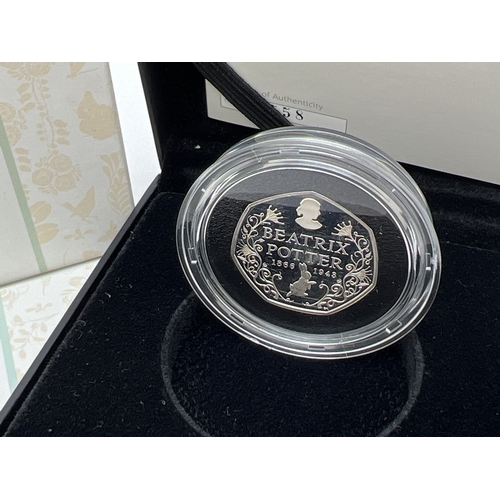 67 - A boxed 150th Anniversary of Beatrix Potter 2016 silver proof 50p coin in clear capsule, by The Roya... 