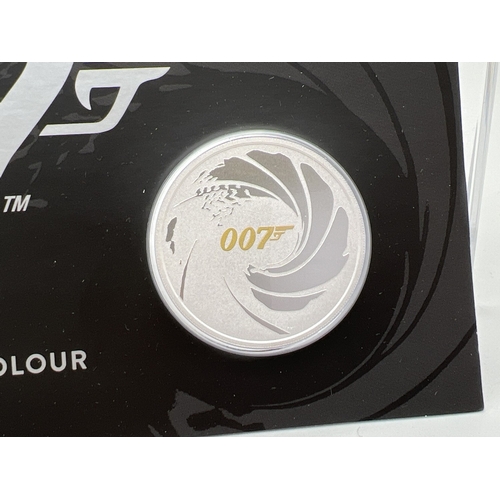 88 - A limited edition Perth Mint James Bond 007 1oz silver proof  1 dollar coin. Gold coloured detail to... 