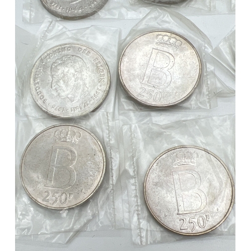 89 - 10 vintage Belgian silver coins. 8 x 250 Franc Baudouin 25th Anniversary of Accession coins and 2 x ... 