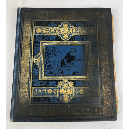 228 - A late Victorian scrap album with blue cloth cover and gilt detail, dated inside 1983. Containing as... 