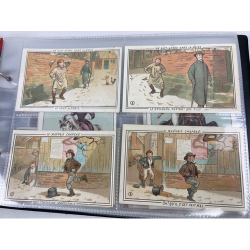 232 - An album of 200+ assorted Victorian & Edwardian continental large sized collectors cards, mostly Fre... 