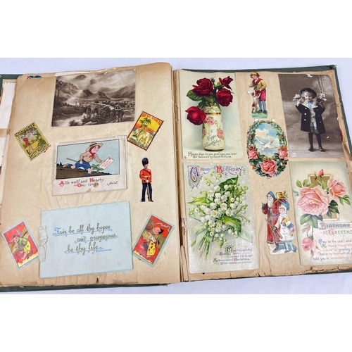 235 - A late Victorian green cloth bound scrap album with red detail and stork in flight design to cover. ... 