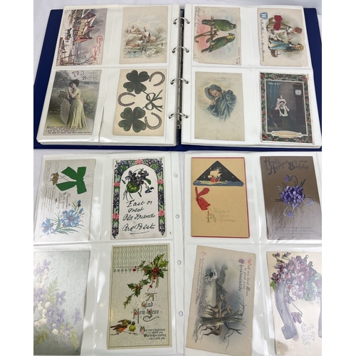 242 - A binder containing approx. 120 assorted Edwardian and vintage greetings cards. In clear plastic dis... 