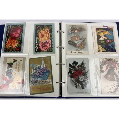 242 - A binder containing approx. 120 assorted Edwardian and vintage greetings cards. In clear plastic dis... 