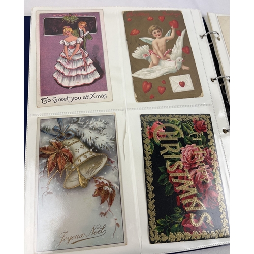 242 - A binder containing approx. 120 assorted Edwardian and vintage greetings cards. In clear plastic dis... 