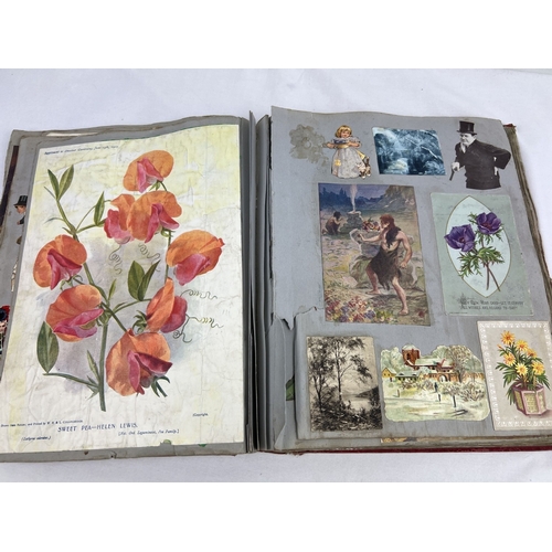 244 - An Edwardian scrap album of assorted prints, scraps, calendars and greetings cards. Some dated 1907.