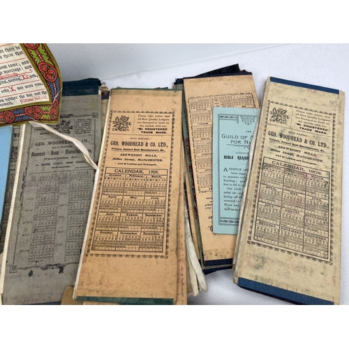 249 - A box of assorted early 20th century ephemera to include calendars, book marks, postcards, correspon... 