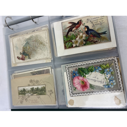 254 - An album containing approx. 172 assorted Victorian & Edwardian greetings cards displayed in clear pl... 