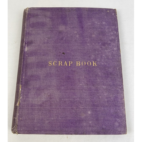 255 - A late Victorian scrap album containing assorted greetings cards, etchings and scraps to include ani... 