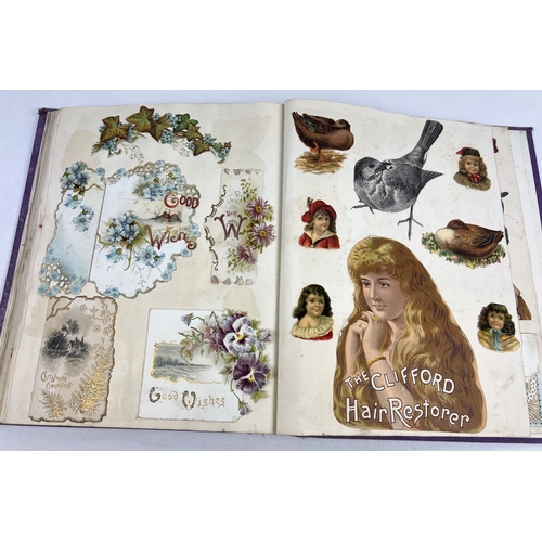 255 - A late Victorian scrap album containing assorted greetings cards, etchings and scraps to include ani... 