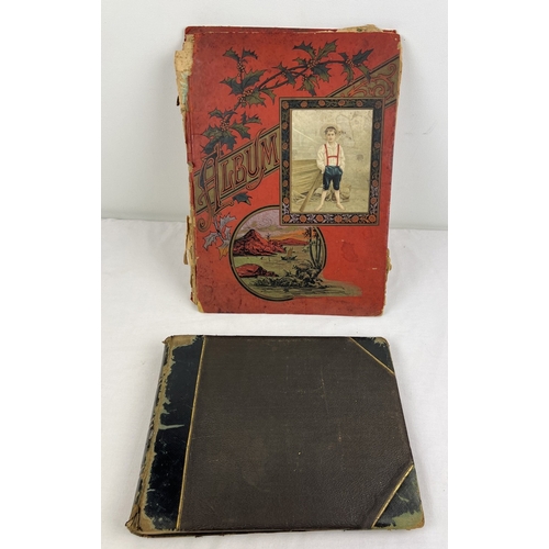 260 - 2 Victorian scrap albums - a large red coloured album (a/f) together with a leather bound album, bot... 