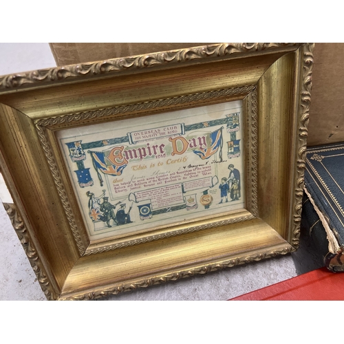 274 - A box of assorted ephemera items to include empty albums, a framed Empire Day certificate, Edwardian... 