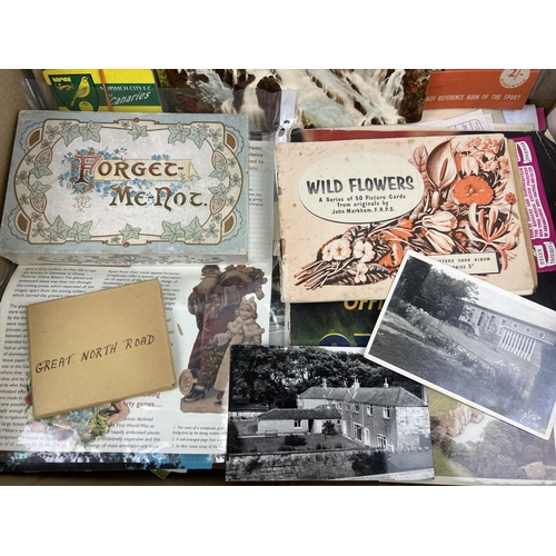 276 - A box of assorted vintage ephemera to include programmes, magazines, scraps, postcards, Red Letter D... 