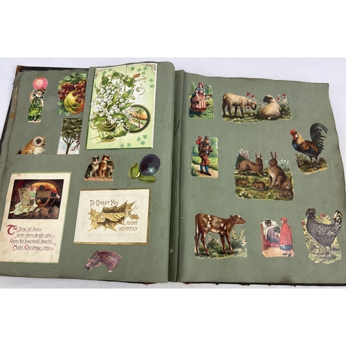 283 - A leather bounder Victorian scrap album (a/f) containing assorted greetings cards, coloured prints, ... 