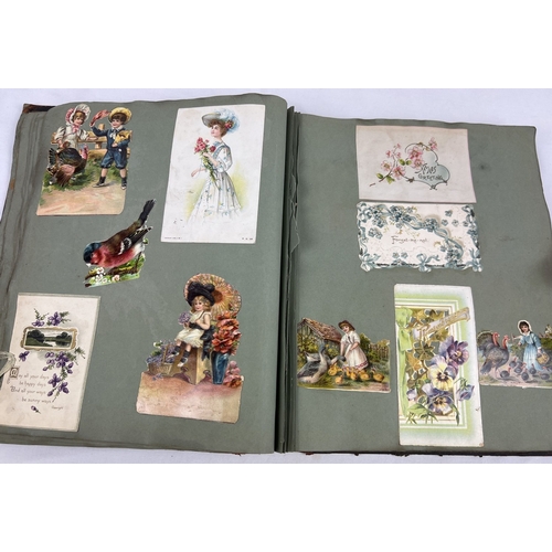 283 - A leather bounder Victorian scrap album (a/f) containing assorted greetings cards, coloured prints, ... 