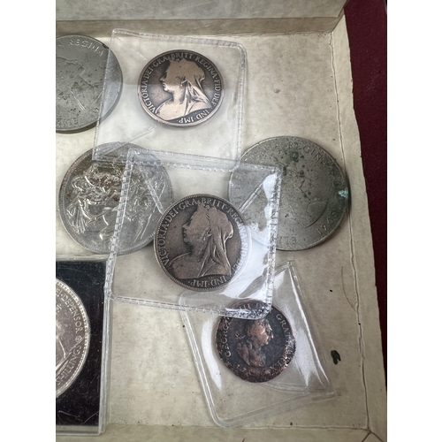 38 - A box containing a collection of antique and vintage coins, mostly commemorative crowns. Lots also i... 