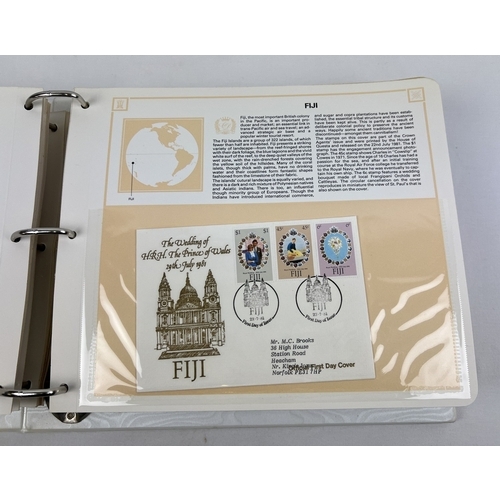 131 - A 1981 Charles and Diana Royal Wedding collectors folder of First Day Covers from The Summer Collect... 