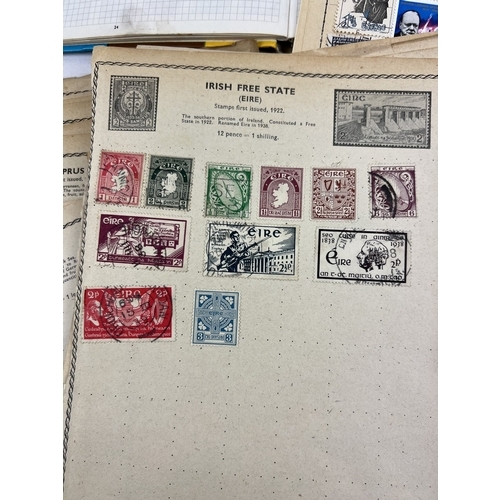 140 - 2 vintage mid century world stamp albums together with a collection of earlier loose album sheets.
